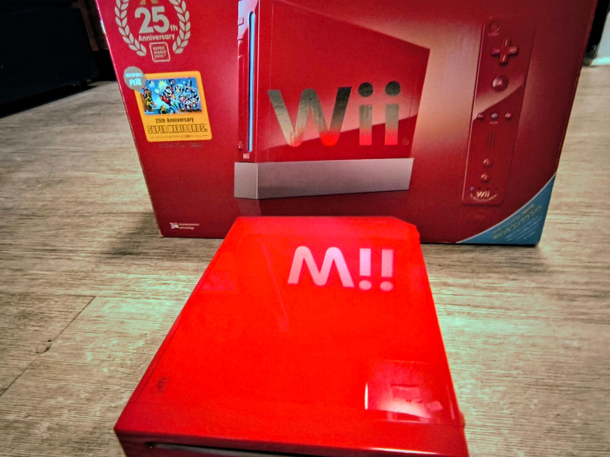 Not An Altered Image! That's The True Reflection of The Gold Lettering From The Box Reflected On The Consoles Shell. This Image Represents The Condition of Both The Consoles and Their Box Sold As This Display Quality Modded Wii Package.